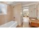 A modern bathroom showcasing mosaic tile and soaking tub at 344 Monroe Dr, Sarasota, FL 34236