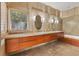 Elegant bathroom featuring double sinks, ample counter space and sleek fixtures at 344 Monroe Dr, Sarasota, FL 34236