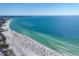 Beautiful aerial shot of the beach showing white sands and clear turquoise waters perfect for swimming at 344 Monroe Dr, Sarasota, FL 34236