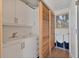 Laundry room features white cabinets and modern sink at 344 Monroe Dr, Sarasota, FL 34236