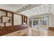 Bright living room with exposed beam ceiling and custom built-ins at 344 Monroe Dr, Sarasota, FL 34236