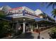 Street-level view of a restaurant with outdoor seating, inviting entrance, and classic signage at 344 Monroe Dr, Sarasota, FL 34236