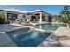 Beautiful backyard pool and patio with jacuzzi, with lounge chairs overlooking the canal at 355 W Royal Flamingo Dr, Sarasota, FL 34236