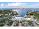 Bird Key Yacht Club overlooking a picturesque harbor filled with boats, offering stunning waterfront amenities at 355 W Royal Flamingo Dr, Sarasota, FL 34236