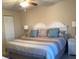 Comfortable bedroom featuring a queen bed with soft pillows and a neutral color scheme for relaxation at 3863 59Th W Ave # 4189, Bradenton, FL 34210