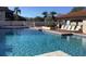 Inviting community pool with ample seating and clear blue water at 3863 59Th W Ave # 4189, Bradenton, FL 34210