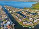 Attractive aerial view of waterfront homes with boat docks and easy access to open waters at 4119 Royal Palm Dr, Bradenton, FL 34210