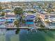 Aerial view of the home with a pool and canal access at 4119 Royal Palm Dr, Bradenton, FL 34210