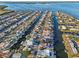 Aerial view of a waterfront neighborhood featuring access to boat canals and docks at 4119 Royal Palm Dr, Bradenton, FL 34210