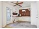 Garage space featuring a workbench, pegboard, and concrete floors at 4119 Royal Palm Dr, Bradenton, FL 34210