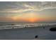 People on the beach watching a gorgeous sunset and ocean views at 4197 66Th Street W Cir, Bradenton, FL 34209