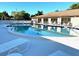 Inviting community pool with lounge chairs for relaxation and leisure at 4197 66Th Street W Cir, Bradenton, FL 34209