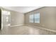 Inviting bedroom with tile flooring, recessed lighting, and access to an ensuite at 421 Potenza Loop, Nokomis, FL 34275