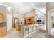 Spacious kitchen area featuring a breakfast bar and stainless steel appliances at 4245 Corso Venetia Blvd, Venice, FL 34293