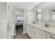 Bathroom featuring dual sinks, modern vanity, and neutral colors at 4310 Falmouth Dr # 102, Longboat Key, FL 34228