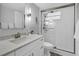 Bathroom with sleek vanity, updated shower and neutral colors at 4310 Falmouth Dr # 102, Longboat Key, FL 34228