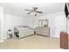 Bright bedroom with tile floors, a ceiling fan, and a neutral color scheme at 4540 Maverick St, North Port, FL 34288