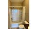 A well-maintained bathroom with tiled shower-tub, ensuring relaxation and easy maintenance at 4802 51St W St # 1210, Bradenton, FL 34210