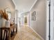 Inviting foyer with tile flooring, decorative table, neutral paint colors, and stylish accents at 4802 68Th Street E Cir, Bradenton, FL 34203