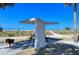 Picnic table and grill shaded by modern shelter at Siesta Key Beach at 4937 Thames Ln, Sarasota, FL 34238