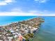 Beautiful community aerial showcasing beachfront living and direct gulf access perfect for boating, fishing, or just enjoying sunsets at 5031 N Beach Rd # 222, Englewood, FL 34223