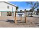 Community sign for Manasota Shores, inviting residents and visitors to a peaceful and picturesque neighborhood at 5031 N Beach Rd # 222, Englewood, FL 34223