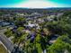 Lovely aerial view of a house with a blue sky horizon in a residential area at 507 67Th W Ave, Bradenton, FL 34207