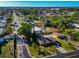 A high-angle shot capturing the neighborhood and the house with a pool at 507 67Th W Ave, Bradenton, FL 34207