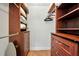 Spacious walk-in closet with custom shelving, drawers, and ample storage space at 507 67Th W Ave, Bradenton, FL 34207