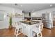 Kitchen featuring stainless appliances, updated cabinets, dark countertops and designer backsplash at 507 67Th W Ave, Bradenton, FL 34207