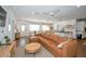 Spacious living room connected to the kitchen and dining area, featuring modern furnishings and decor at 507 67Th W Ave, Bradenton, FL 34207