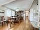 Comfortable dining area featuring a wood table, ceiling fan, and wood-look flooring at 511 50Th Avenue W Dr, Bradenton, FL 34207