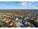 Beautiful aerial view of the waterfront home in a lush tropical neighborhood with nearby town amenities at 537 Fore Dr, Bradenton, FL 34208