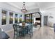 Bright dining area featuring a wood table, stylish chairs, and an open layout with natural light at 537 Fore Dr, Bradenton, FL 34208