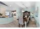 Inviting dining room with modern chandelier, hutch, and soft paint at 537 Fore Dr, Bradenton, FL 34208