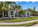 Charming single-Gathering home with a well-manicured lawn and lush palm trees at 537 Fore Dr, Bradenton, FL 34208