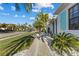 Street view featuring lovely home with lush landscaping, charming sidewalk and perfectly manicured lawn in a nice community at 537 Fore Dr, Bradenton, FL 34208