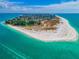 Breathtaking aerial view of the island's beaches and clear turquoise waters at 5807 De Palmas Ave, Holmes Beach, FL 34217