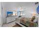 Serene bedroom featuring a comfortable bed, soft lighting, and a dresser, creating a relaxing retreat at 5807 De Palmas Ave, Holmes Beach, FL 34217