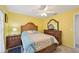 Bedroom with modern bed frame, side tables, and dresser at 6330 Green Oak Cir # D, Bradenton, FL 34203