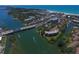 Scenic aerial shot showcasing the community's waterways, bridge access, and coastal charm at 6415 Midnight Pass Rd # 508, Sarasota, FL 34242