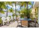 Beautiful brick patio with outdoor seating, ideal for enjoying warm weather at 6606 Holmes Blvd # 3, Holmes Beach, FL 34217