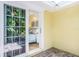 Bedroom patio featuring brick pavers and lush foliage at 6606 Holmes Blvd # 3, Holmes Beach, FL 34217