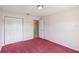 Bedroom with a pink carpet, standard closet, and ample natural light at 6637 Deering Cir, Sarasota, FL 34240