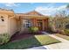 Inviting home exterior features lush landscaping and a welcoming front porch at 6637 Deering Cir, Sarasota, FL 34240