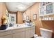 Functional bathroom features ample counter space, a vanity sink, and neutral wall color at 6640 Peacock Rd, Sarasota, FL 34242