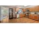 Modern kitchen with stainless steel appliances, granite countertops, and a wine cooler at 6716 Keystone Dr, Sarasota, FL 34231