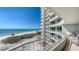 Balcony view of the beach and ocean at 775 Longboat Club Rd # 406, Longboat Key, FL 34228