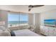 Bright bedroom boasts amazing ocean views, stylish decor, and comfortable seating at 775 Longboat Club Rd # 406, Longboat Key, FL 34228