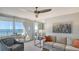 Bright living room with comfortable seating and stunning ocean views at 775 Longboat Club Rd # 406, Longboat Key, FL 34228